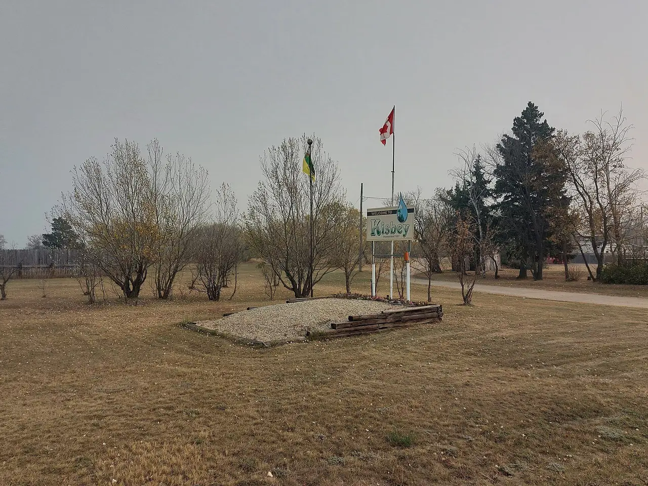 Kisbey welcome sign and flags, 2021